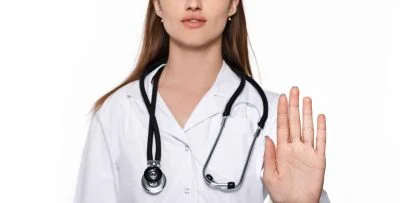 My doctor posted a sign saying she ‘doesn’t take Obamacare.’ What should I do? photo