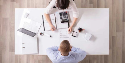 Why do some enrollees take their ACA premium subsidy during the year while others claim it at tax time? photo