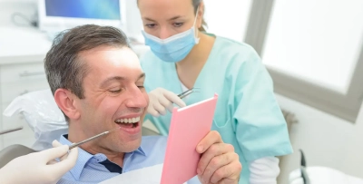 How much does a dental bridge cost without insurance? photo